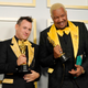 LOS ANGELES, CALIFORNIA - APRIL 25: (L-R) Martin Desmond Roe and Travon Free, winners of Best Live Action Short Film for “Two Distant Strangers”, pose in the press room at the Oscars on Sunday, April 25, 2021, at Union Station in Los Angeles. (Photo by Chris Pizzello-Pool/Getty Images)